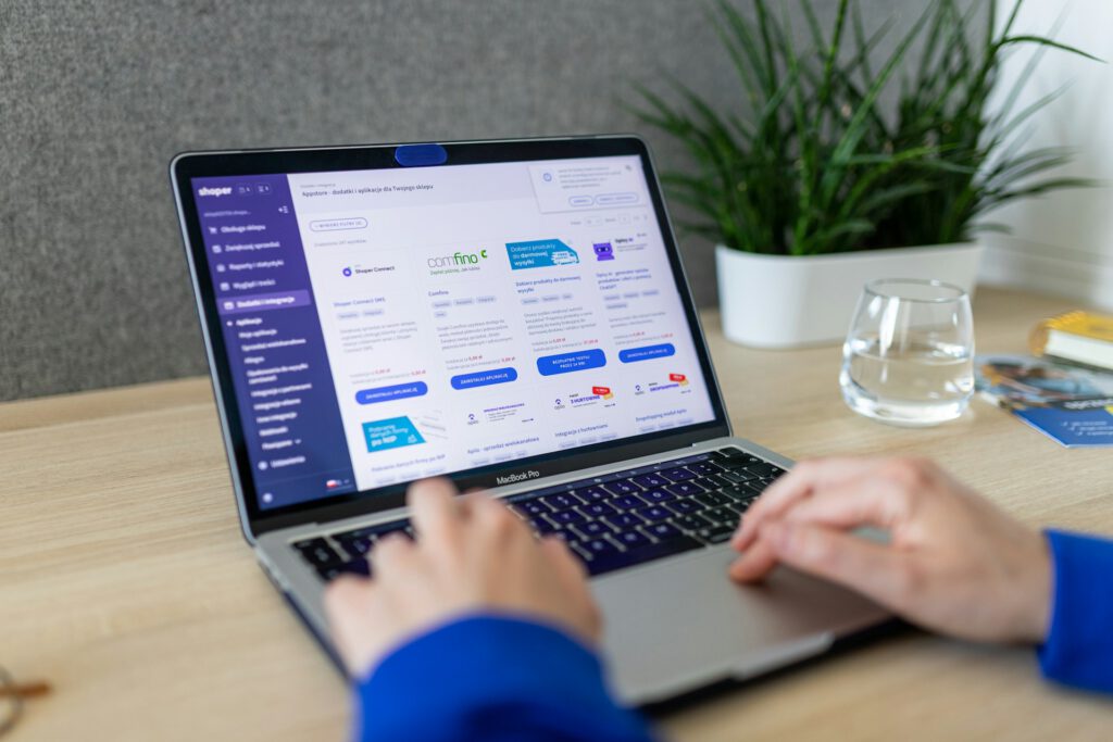 Anika Tannebaum, a specialist in digital customer service processes, working on her laptop.